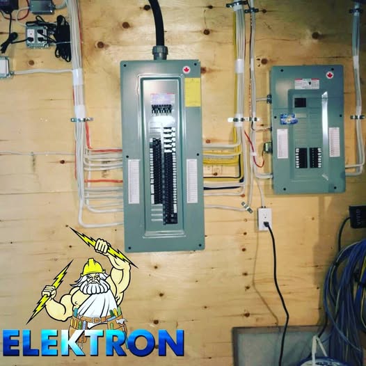 Clean electrical panel install on plywood backing